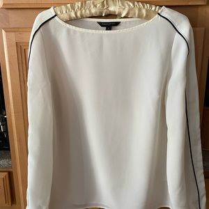 Banana Republic excellent used condition off white/cream top with black piping.